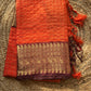 Beautiful semi Banarasi katan silk saree with checks in orange and brown combo
