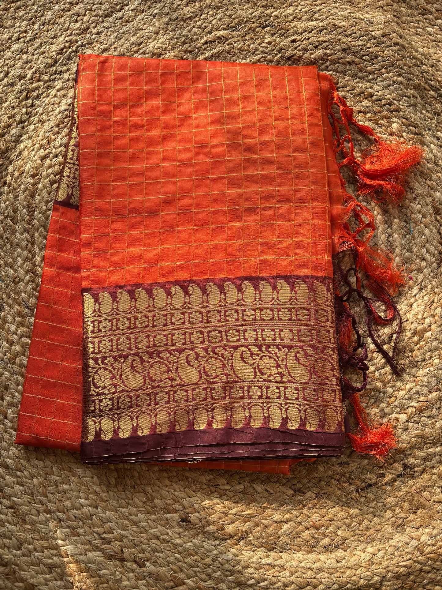 Beautiful semi Banarasi katan silk saree with checks in orange and brown combo