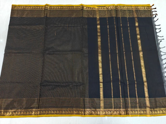 Beautiful black pure kanchi cotton saree with zari stripes and small mango border