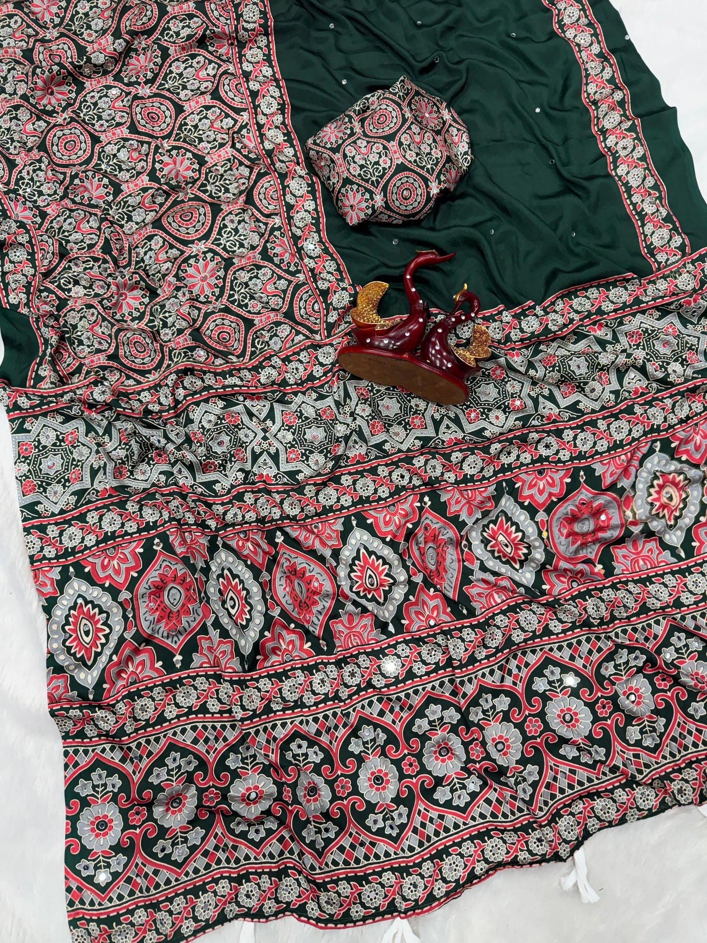 Soft and beautiful crepe silk saree with ajrakh prints and mirror work