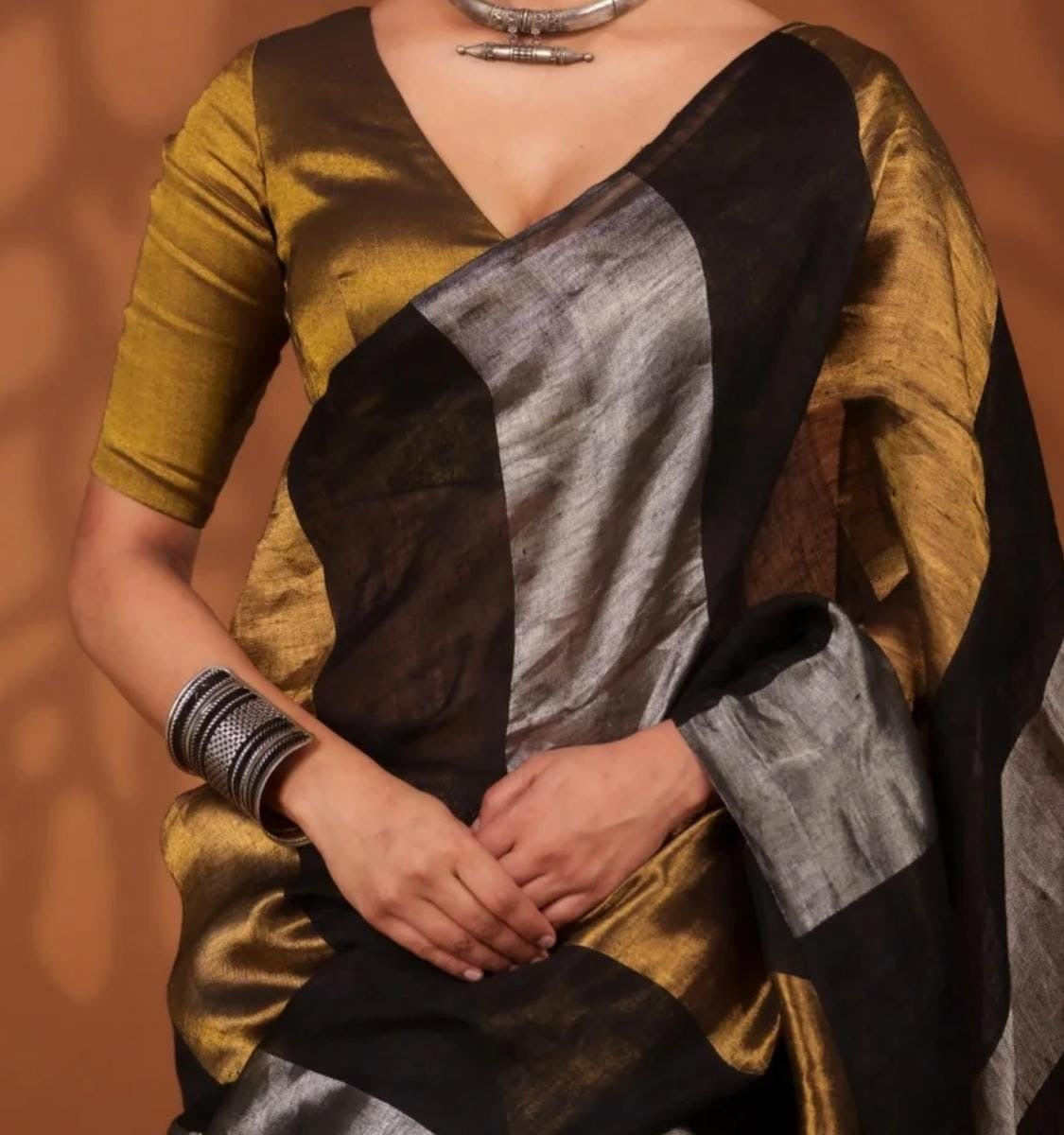 Linen sarees with gold silver zari stripes all over!