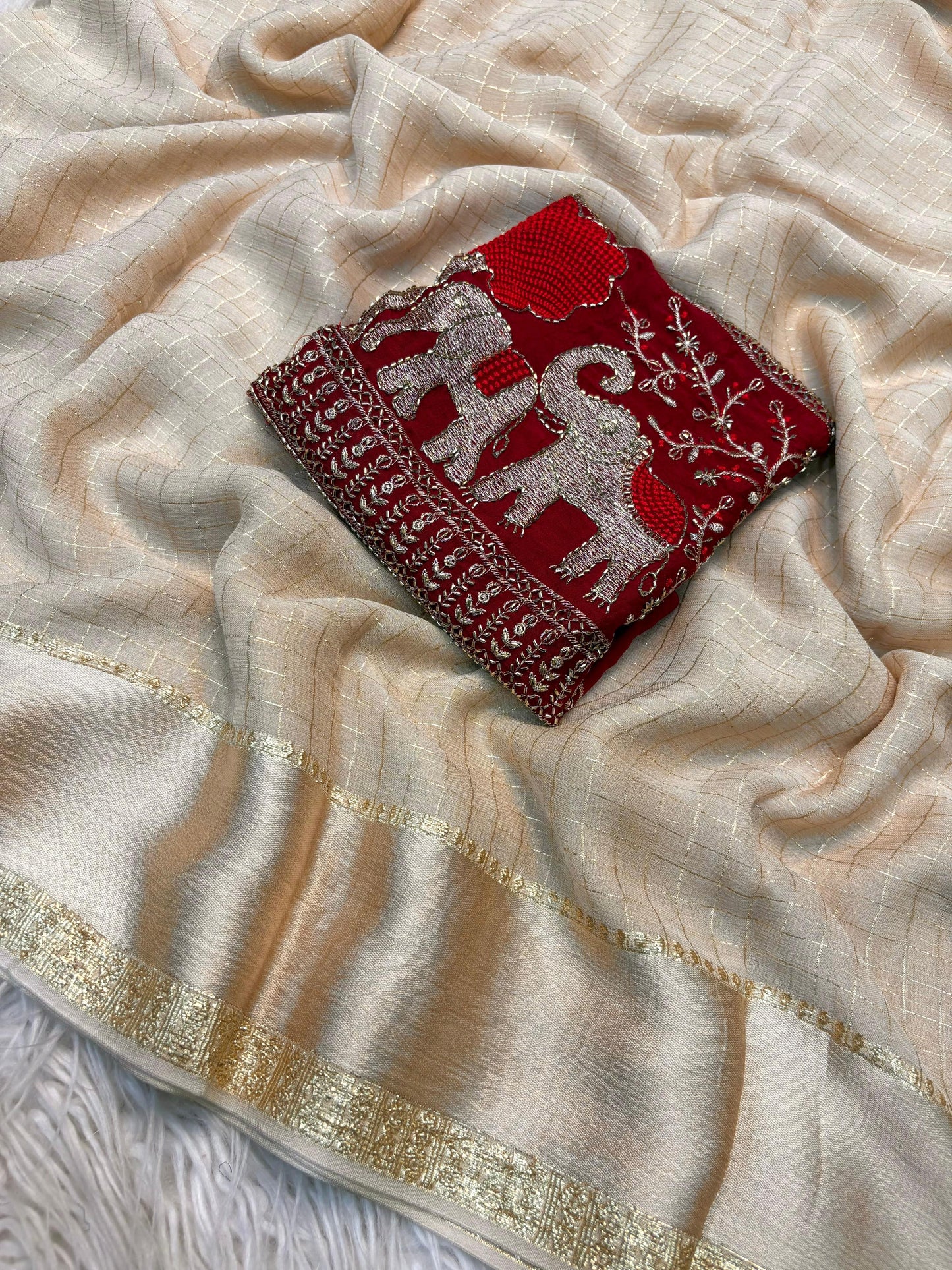 Beautiful viscous georgette checks saree in beige and red elephant blouse