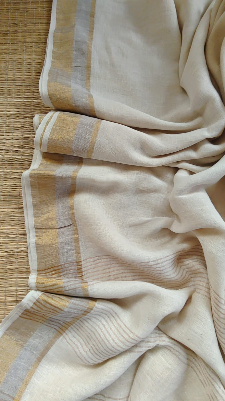 Pure handwoven linen saree with zari borders