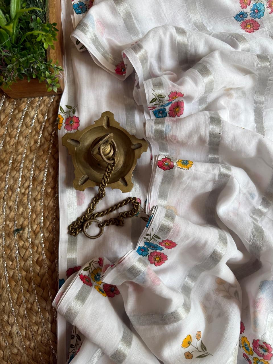 Pure mul cotton saree with cute prints and silver zari stripes