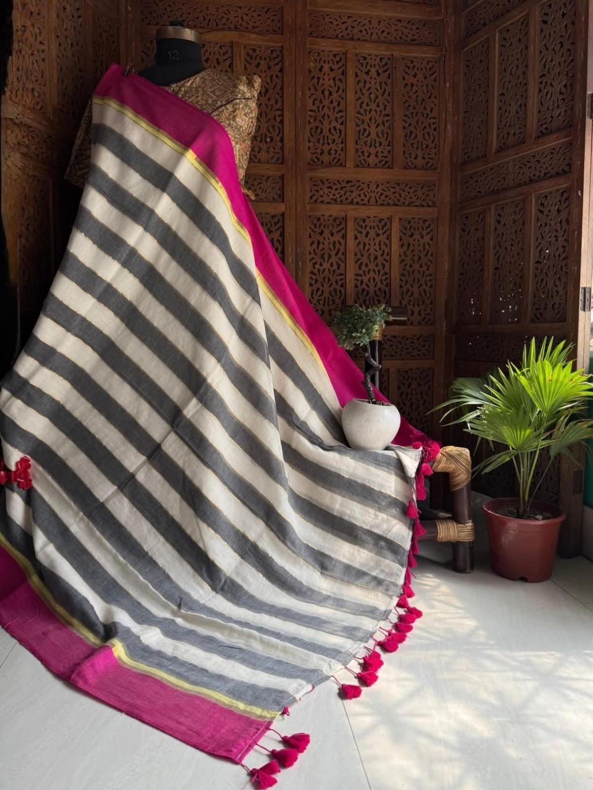Beautiful pure authentic mul cotton saree with black stripes and pink border