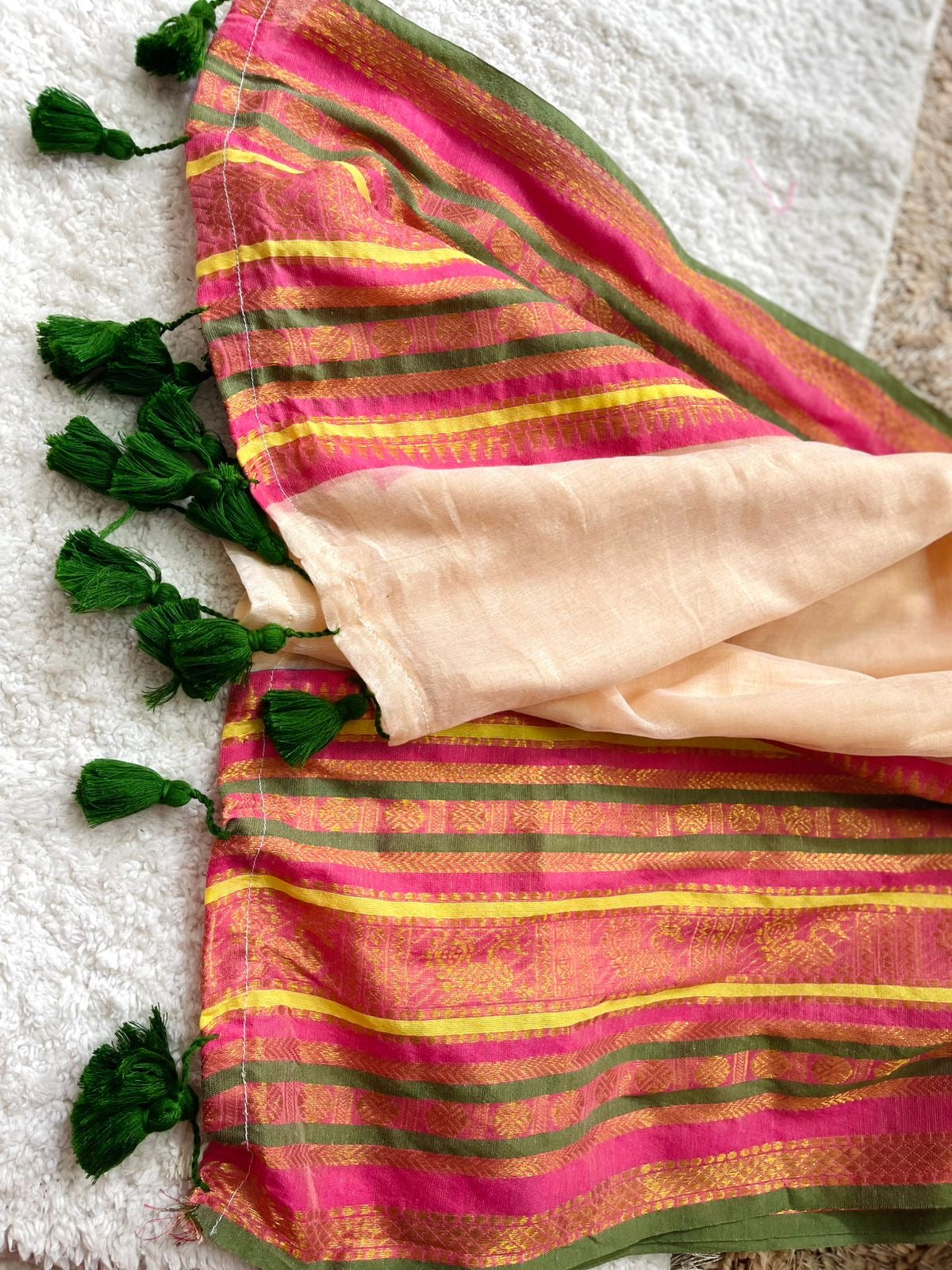Premium pure mul cotton saree with green tassels and jacquard border