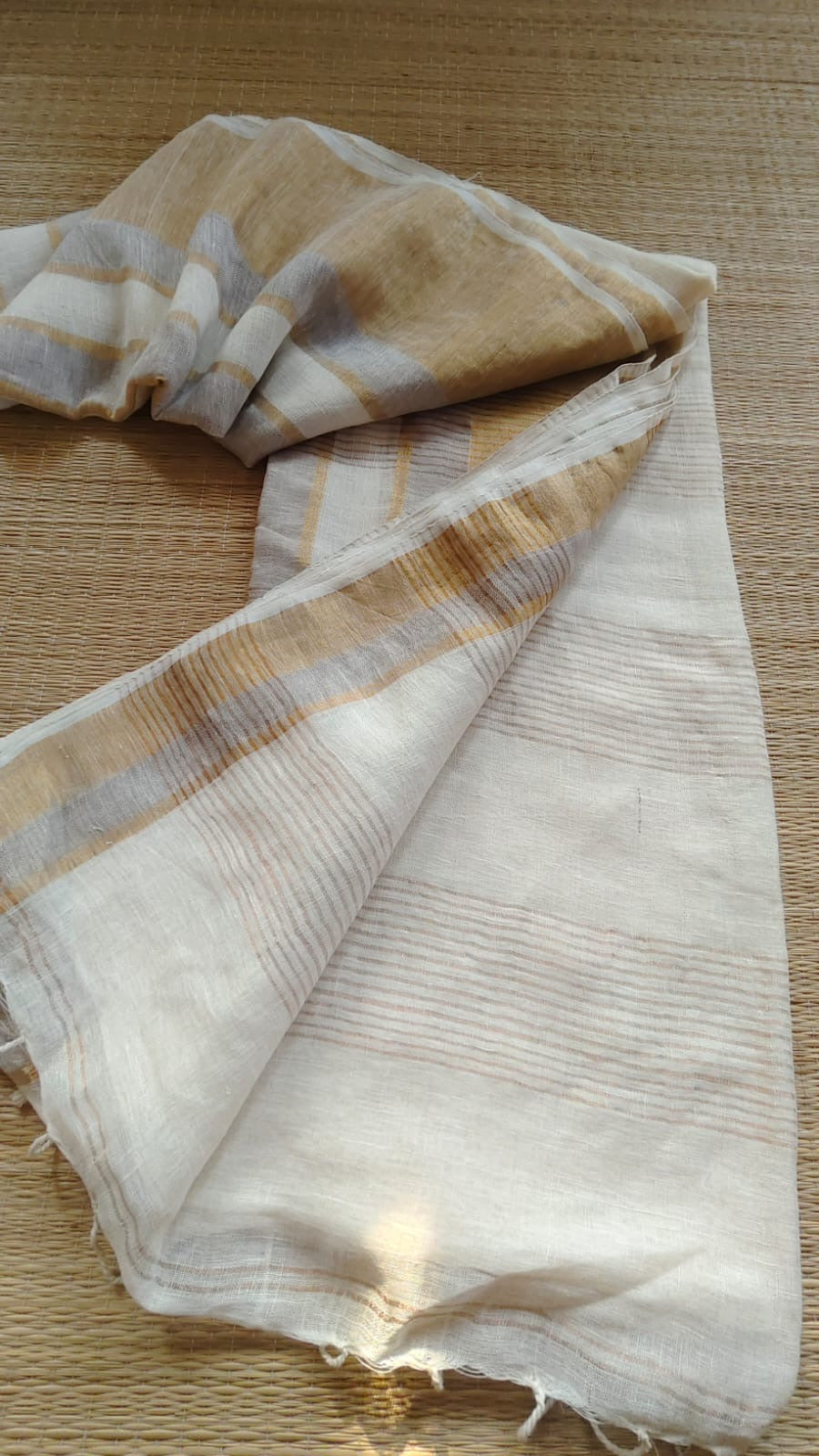 Pure handwoven linen saree with zari borders
