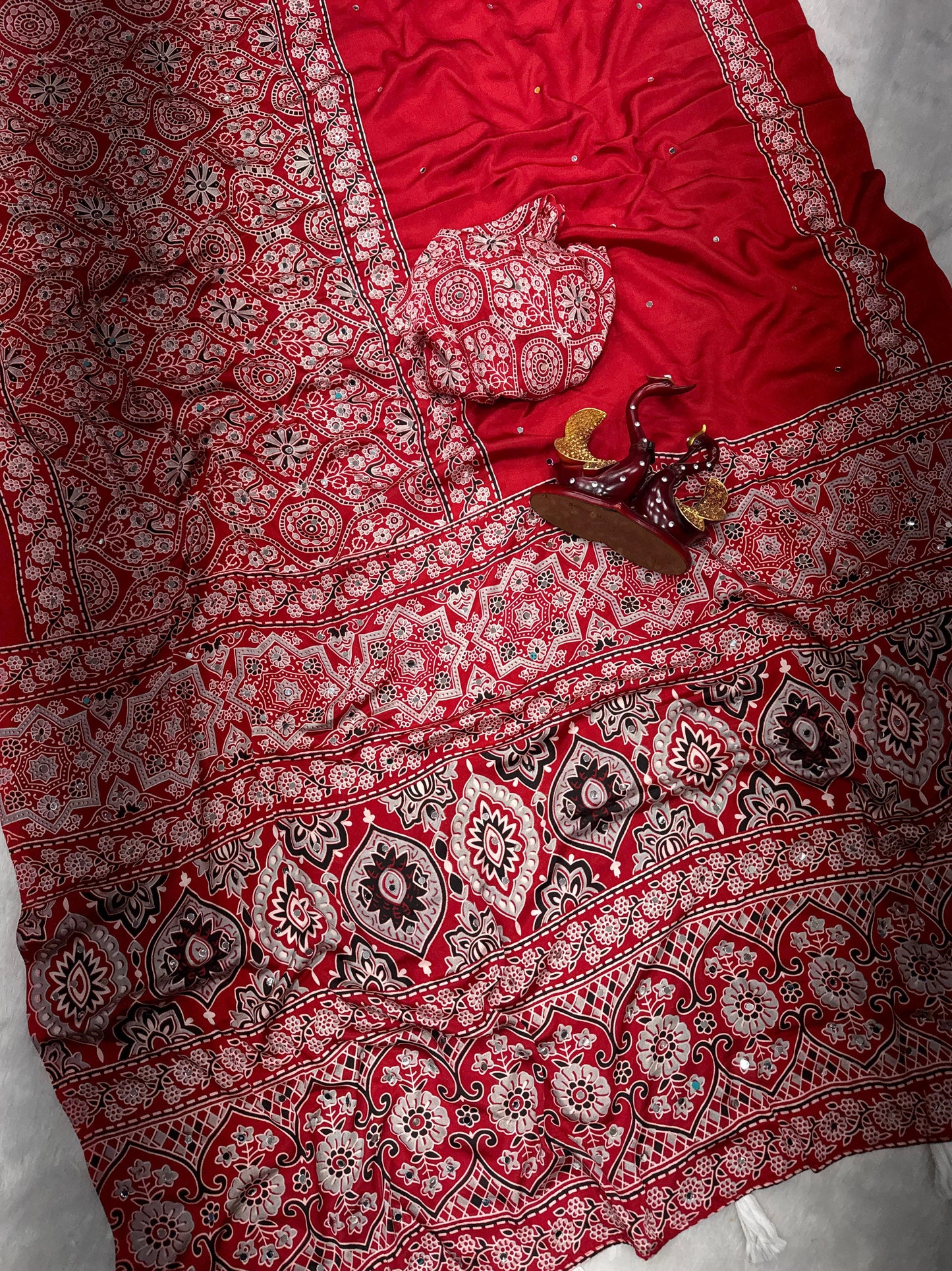 Soft and beautiful crepe silk saree with ajrakh prints and mirror work