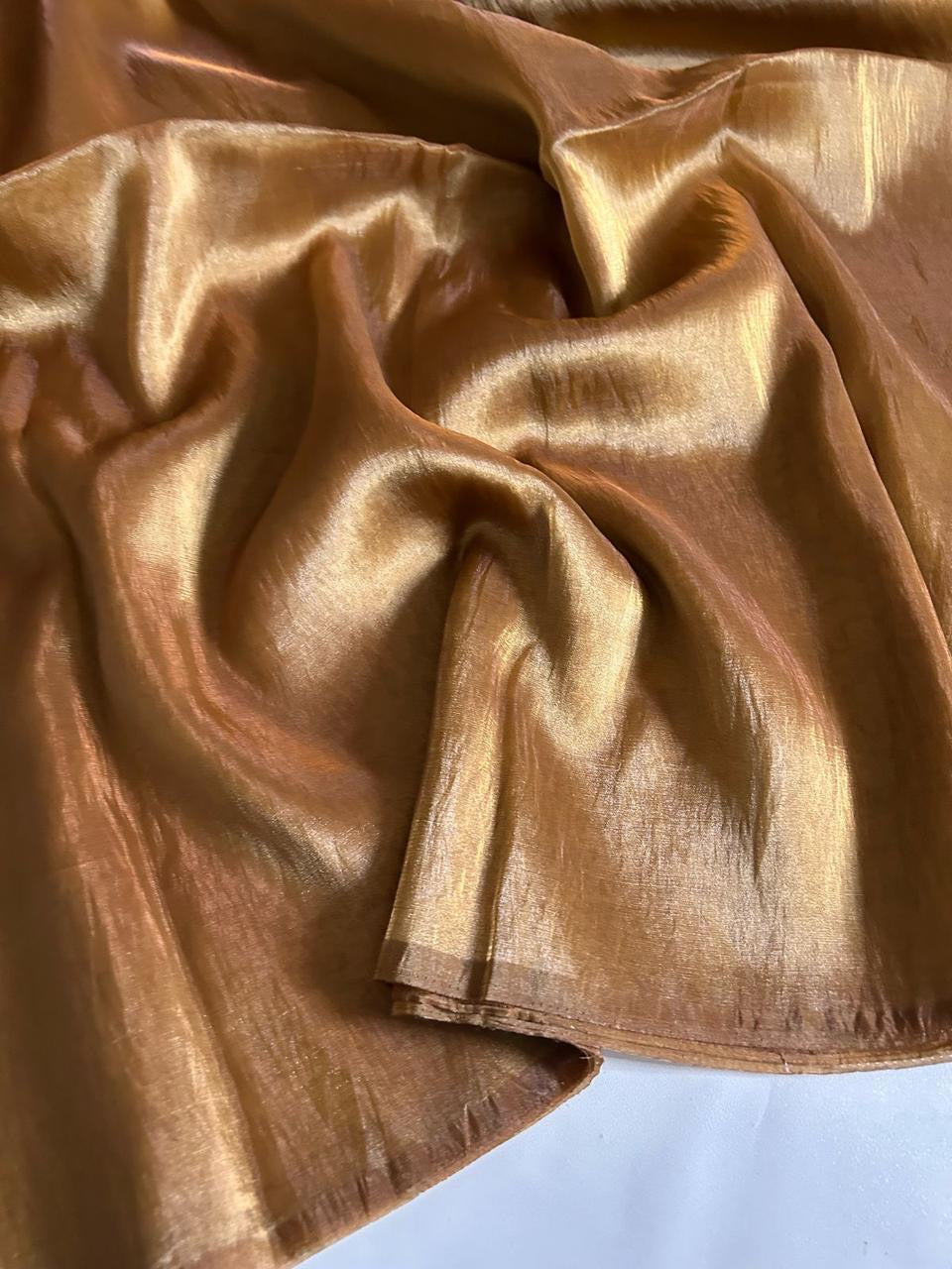 Soft tissue saree with metallic finish