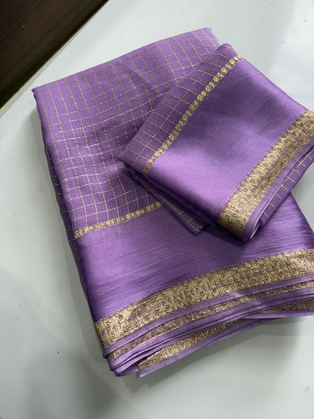 Beautiful viscous georgette saree with checks body and running blouse
