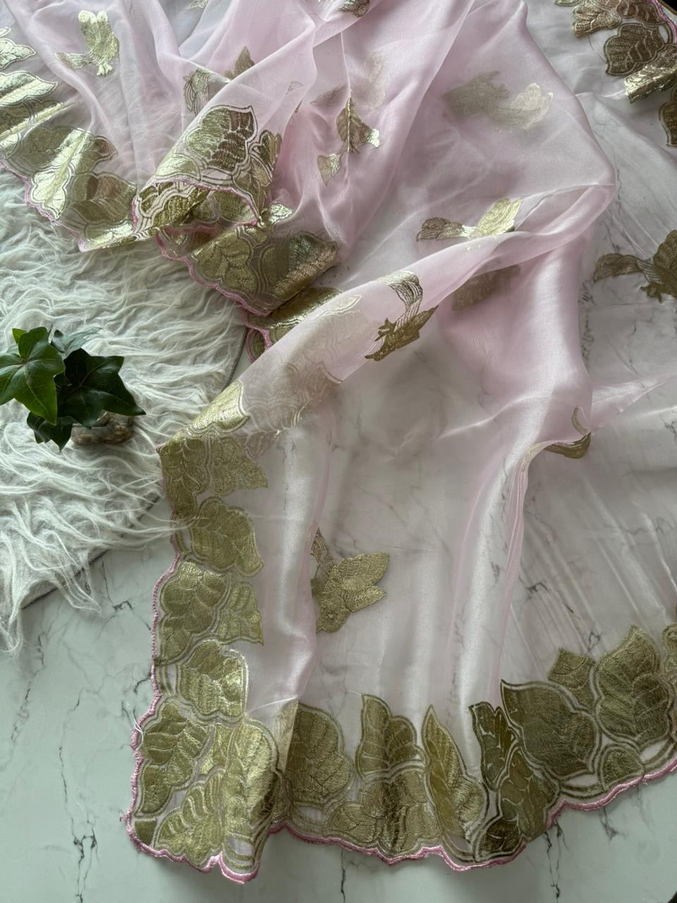 Beautiful semi organza saree with gold zari pitta work border and scalloped edges