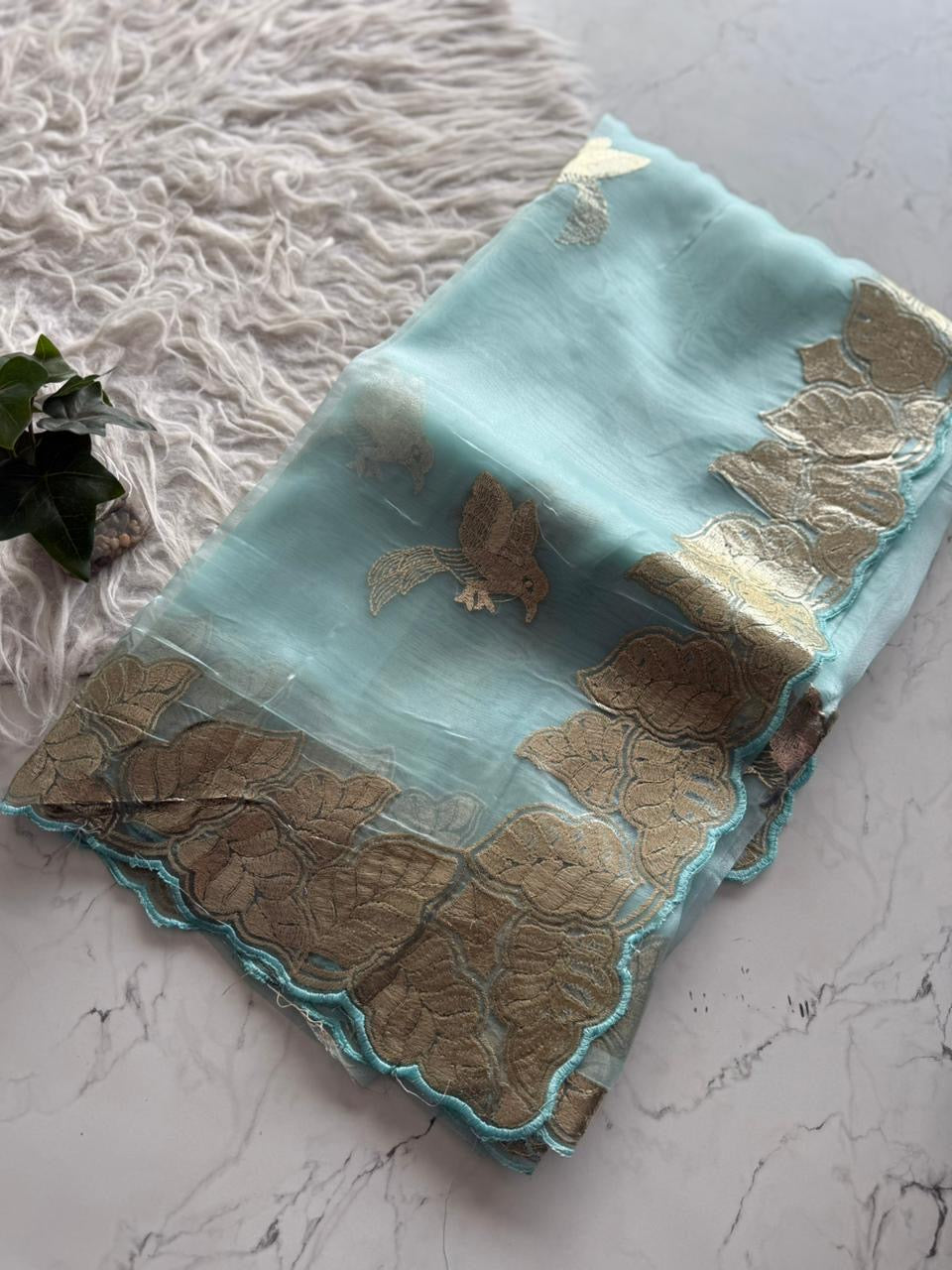 Beautiful semi organza saree with gold zari pitta work border and scalloped edges