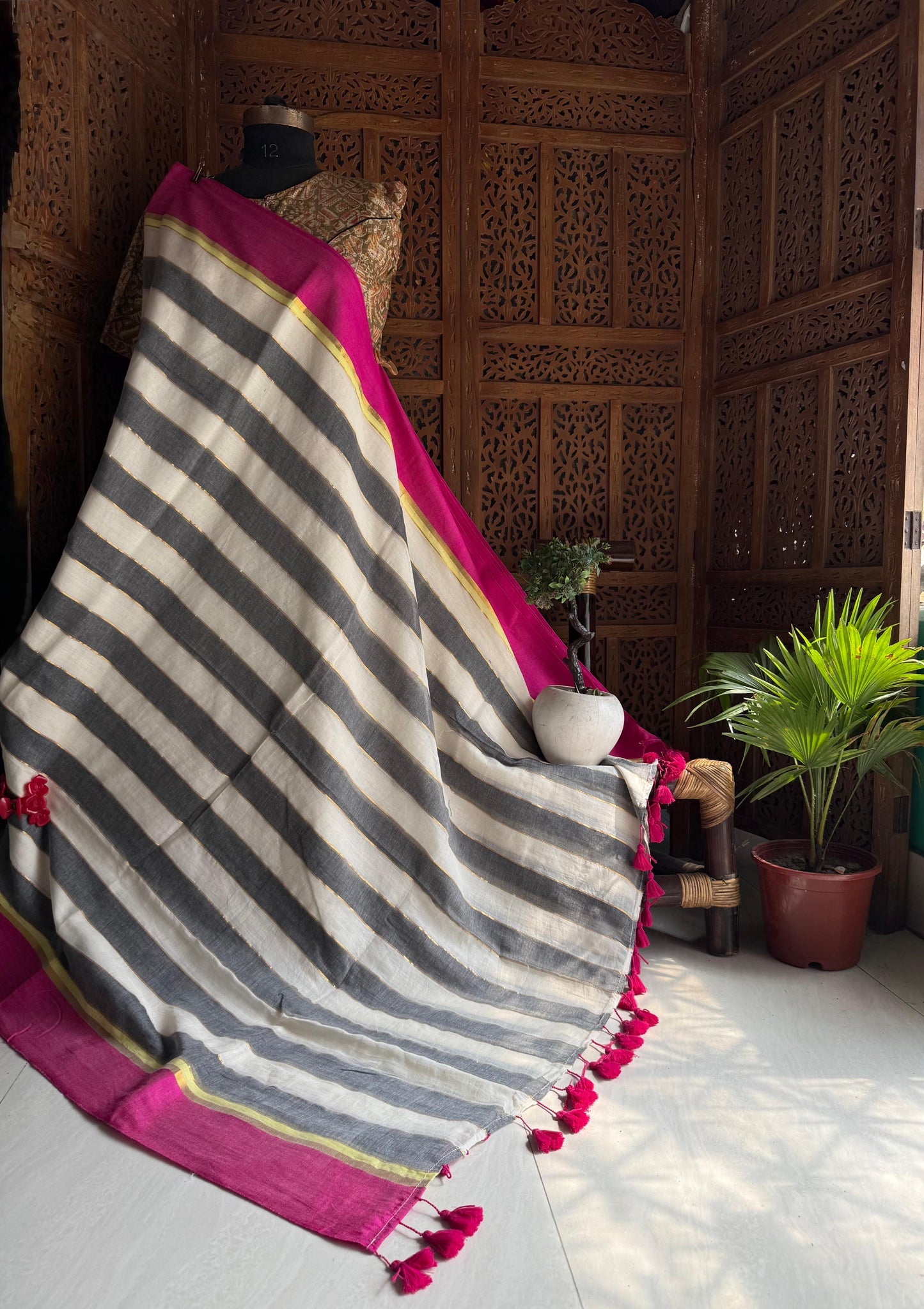 Beautiful pure authentic mul cotton saree with black stripes and pink border