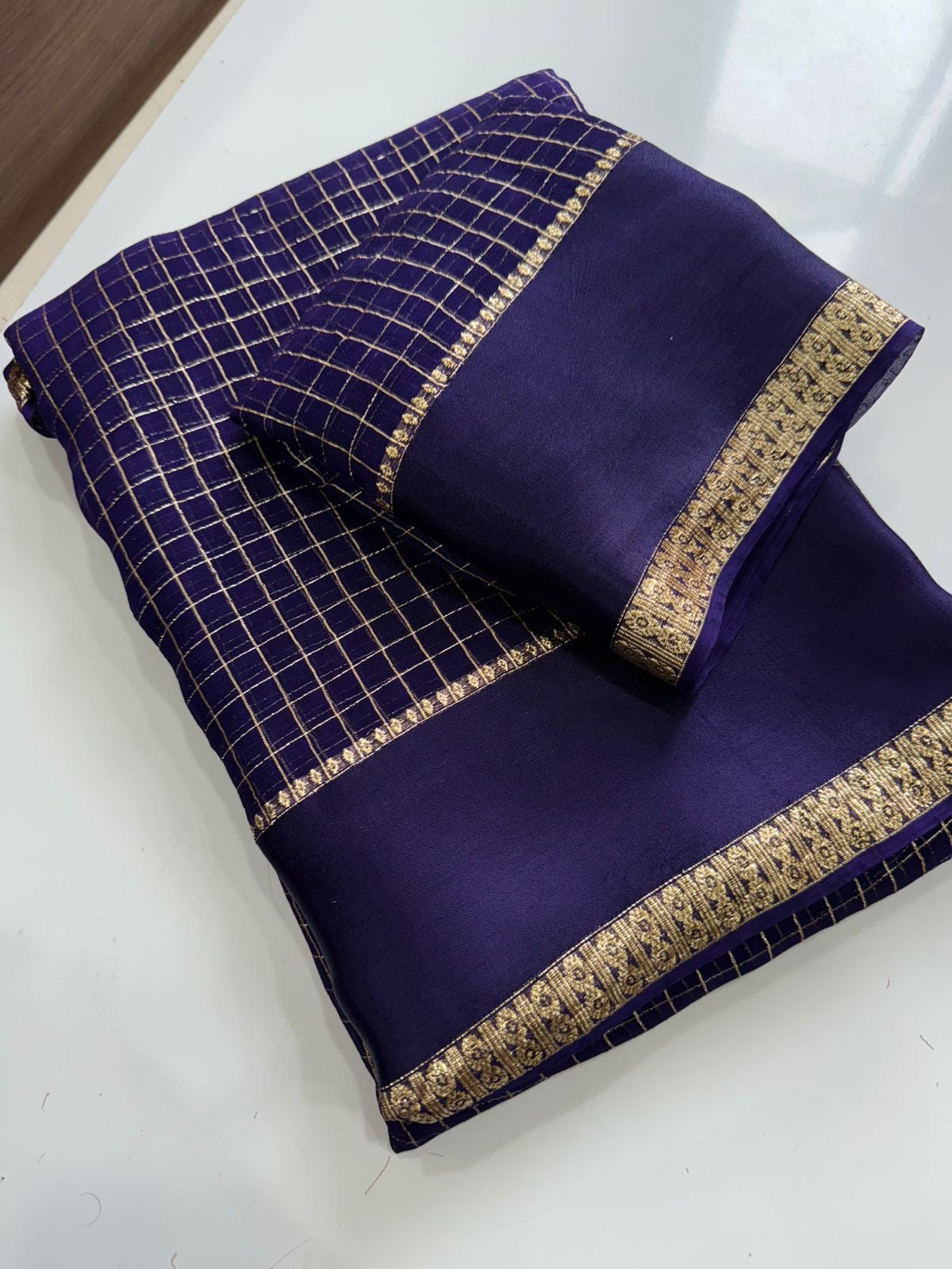 Beautiful viscous georgette saree with checks body and running blouse
