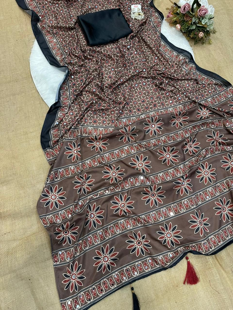 Beautiful semi crepe silk saree with ajrakh prints and mirror work