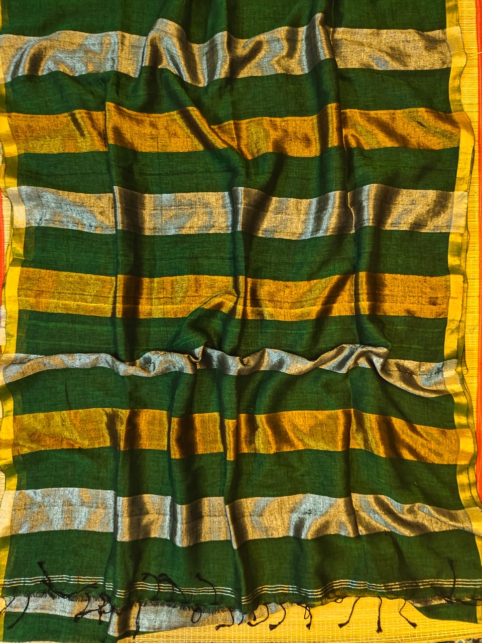 Linen sarees with gold silver zari stripes all over!