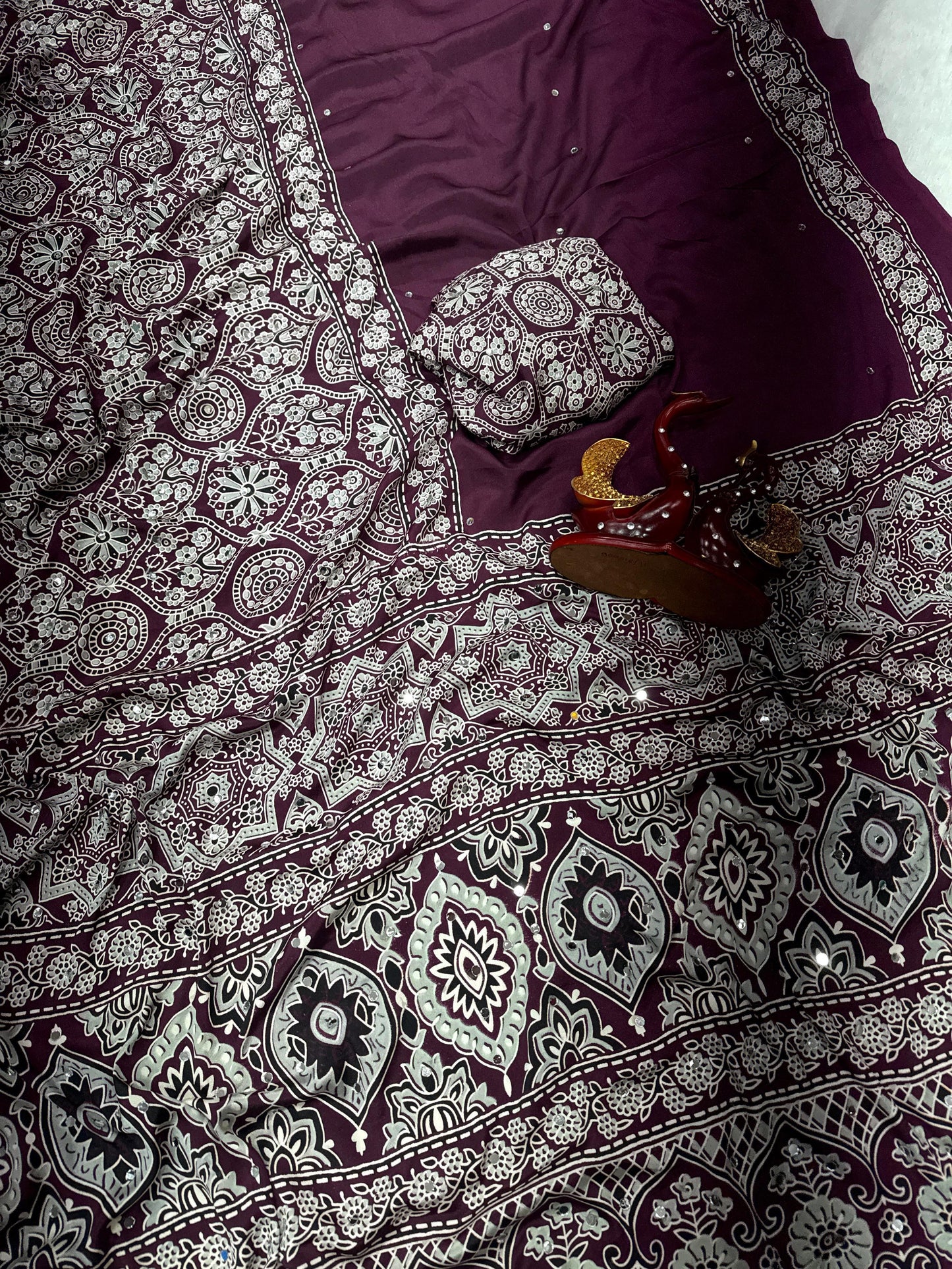 Soft and beautiful crepe silk saree with ajrakh prints and mirror work