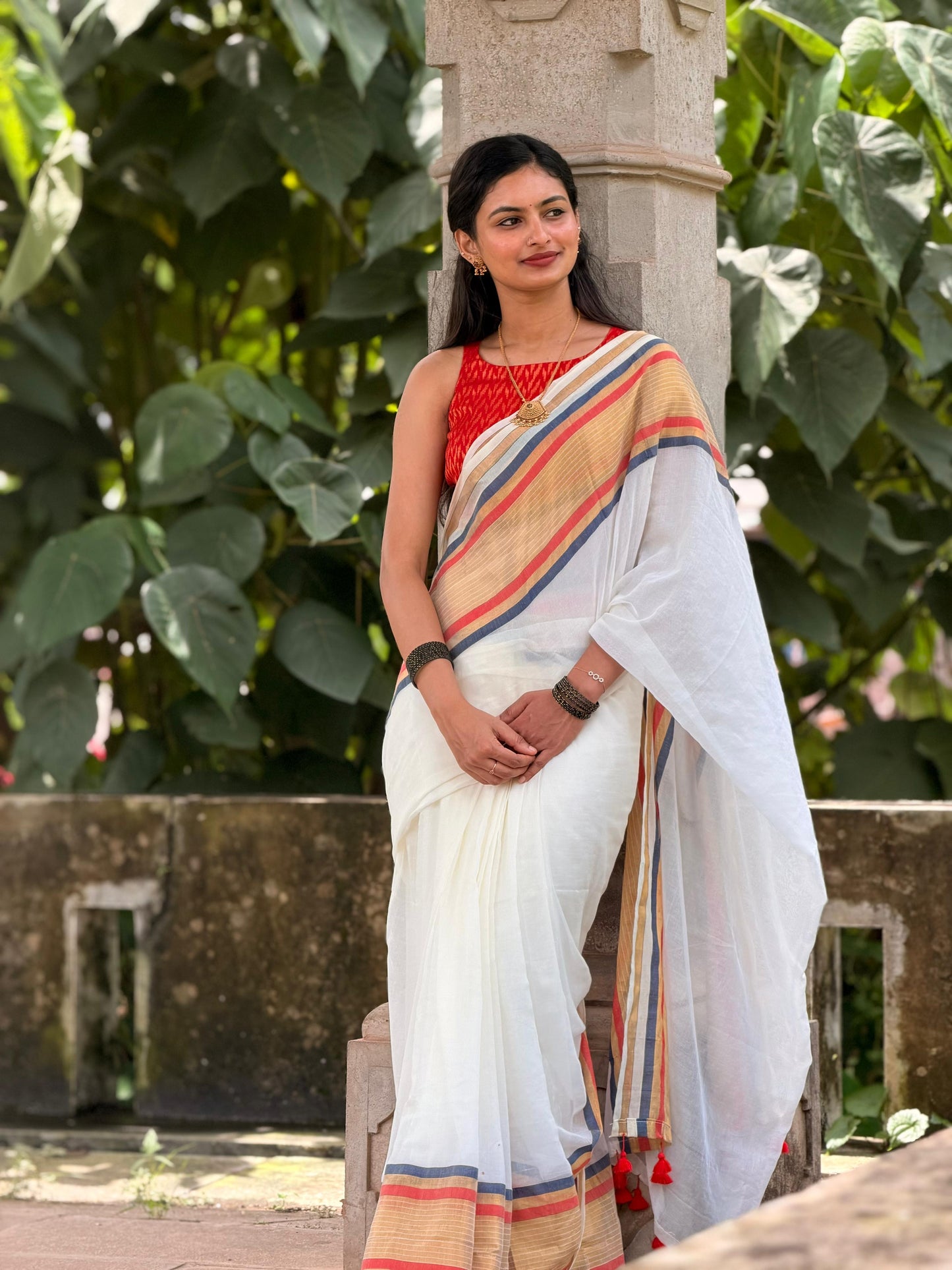 Soft mul cotton saree with beautiful red and black zari stripes border
