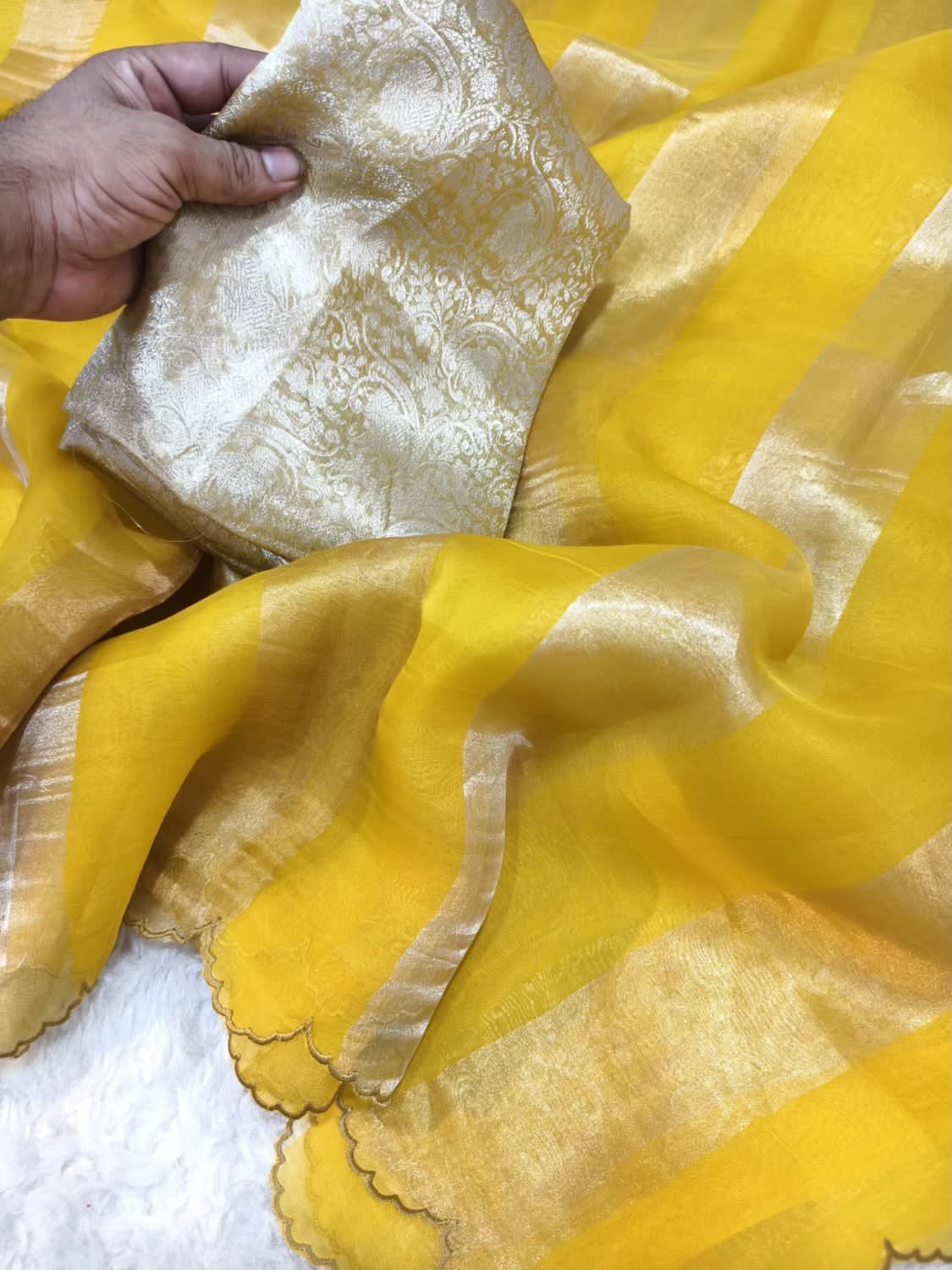 Beautiful georgette tissue silk saree with gold and silver tissue patta