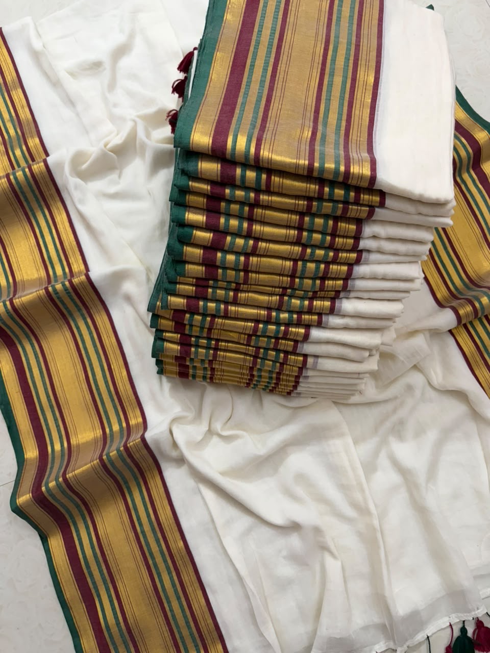 Pure and authentic soft mul cotton saree with maroon and green kanchi zari border