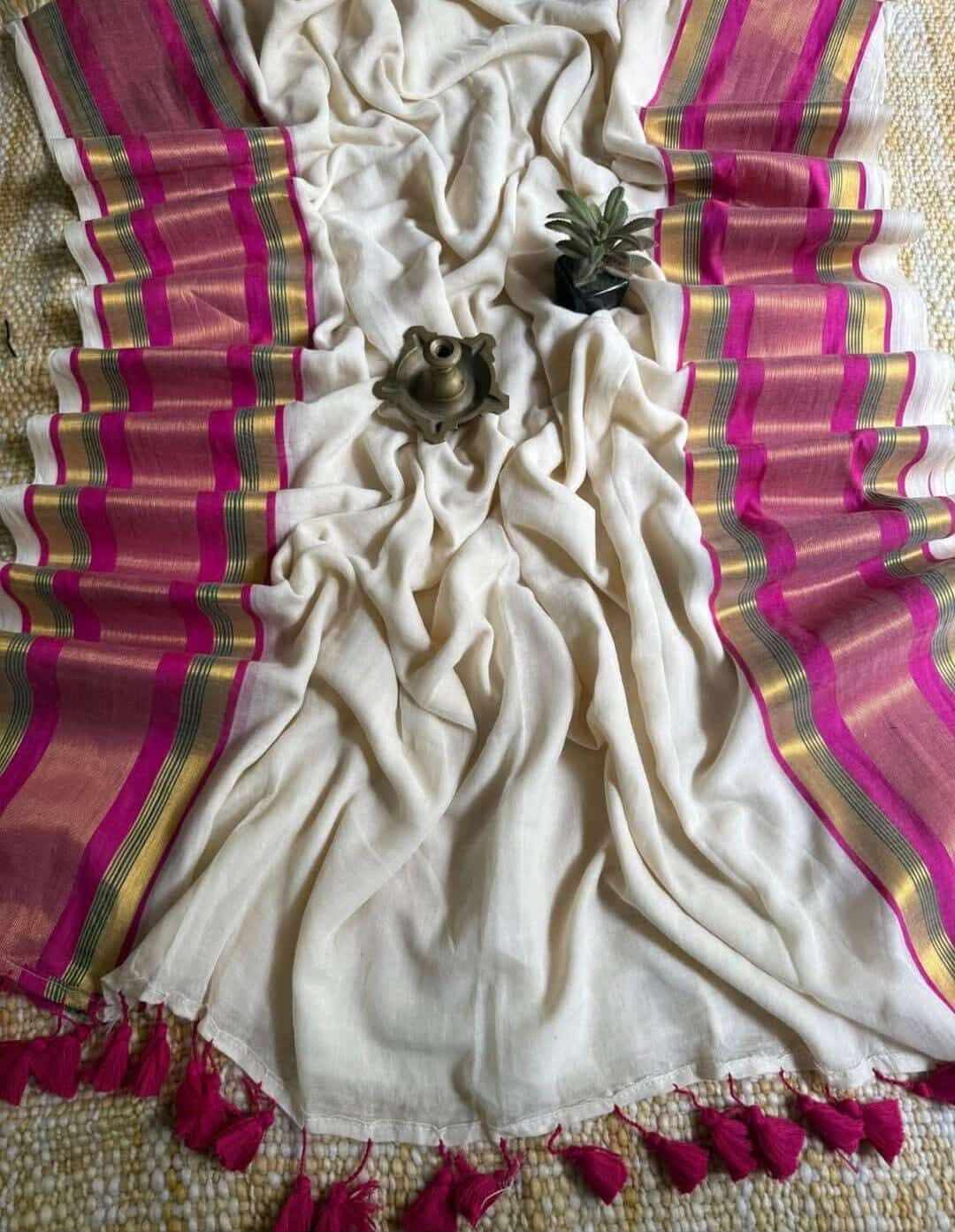 Pure authentic mul cotton saree with pink zari border