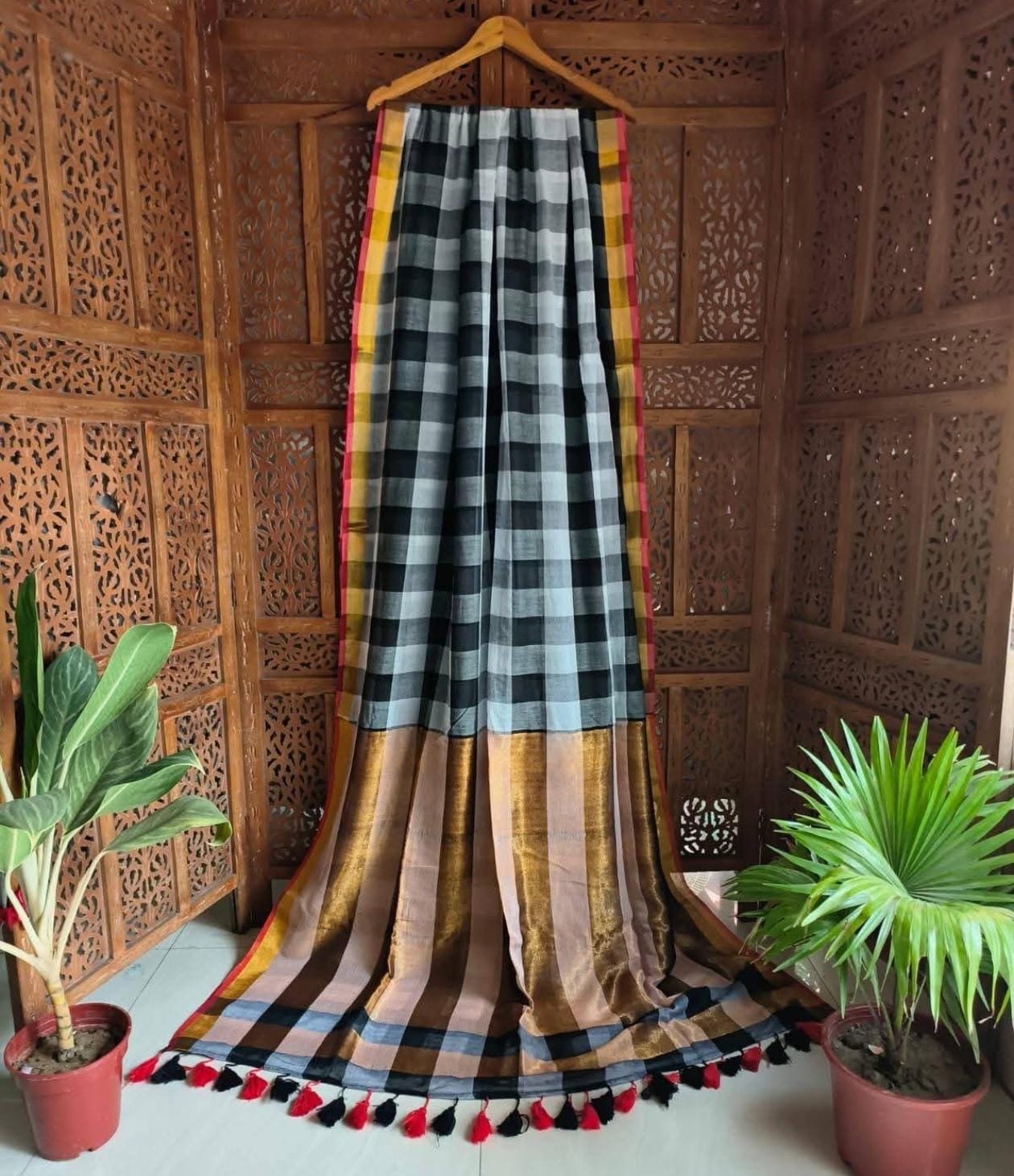 Beautiful pure authentic mul cotton saree with madras checks and woven border