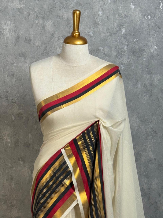 Pure and authentic mul cotton saree with black and red zari border