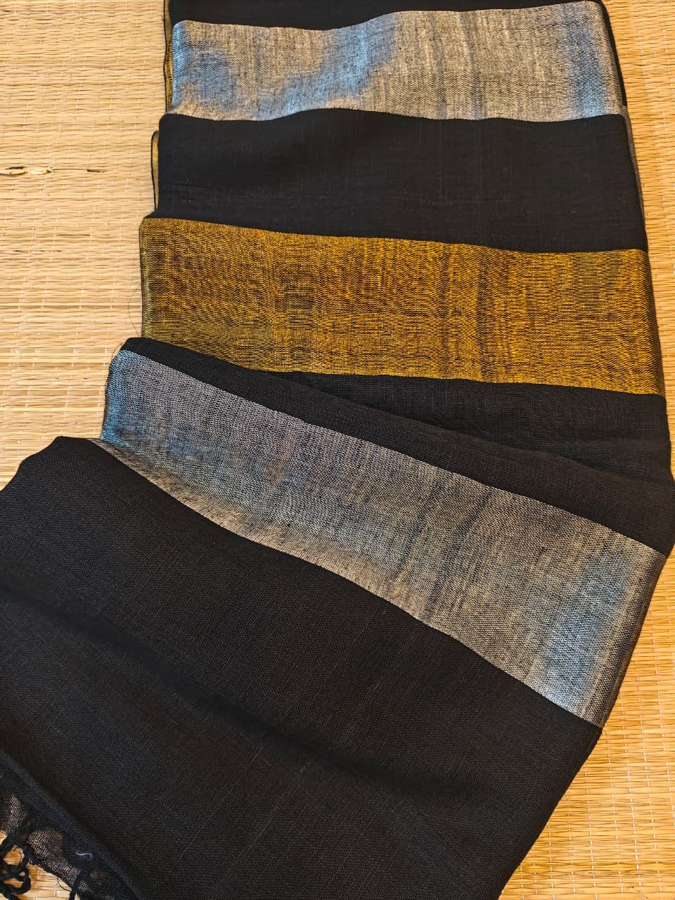 Linen sarees with gold silver zari stripes all over!