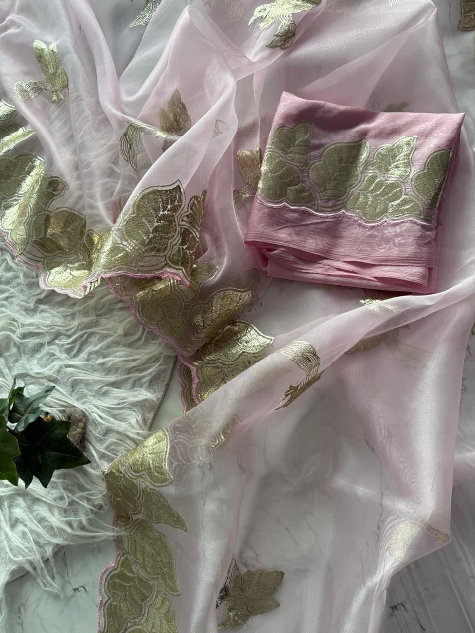 Beautiful semi organza saree with gold zari pitta work border and scalloped edges