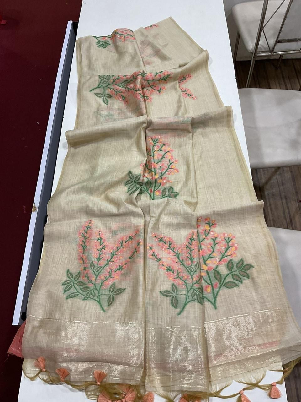 Soft off white muga cotton saree with floral weavings
