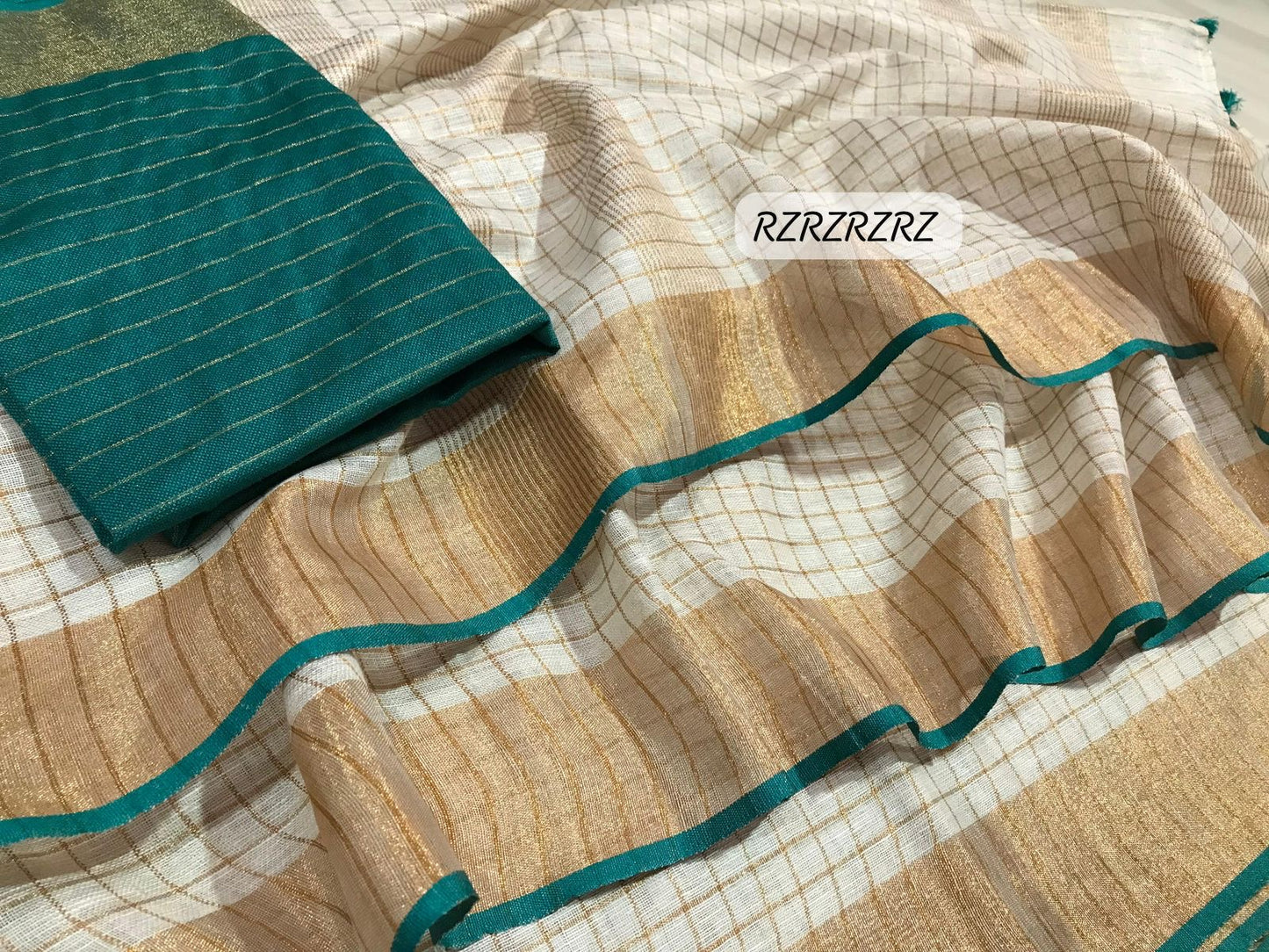 Pure linen checks saree with contrast blouse