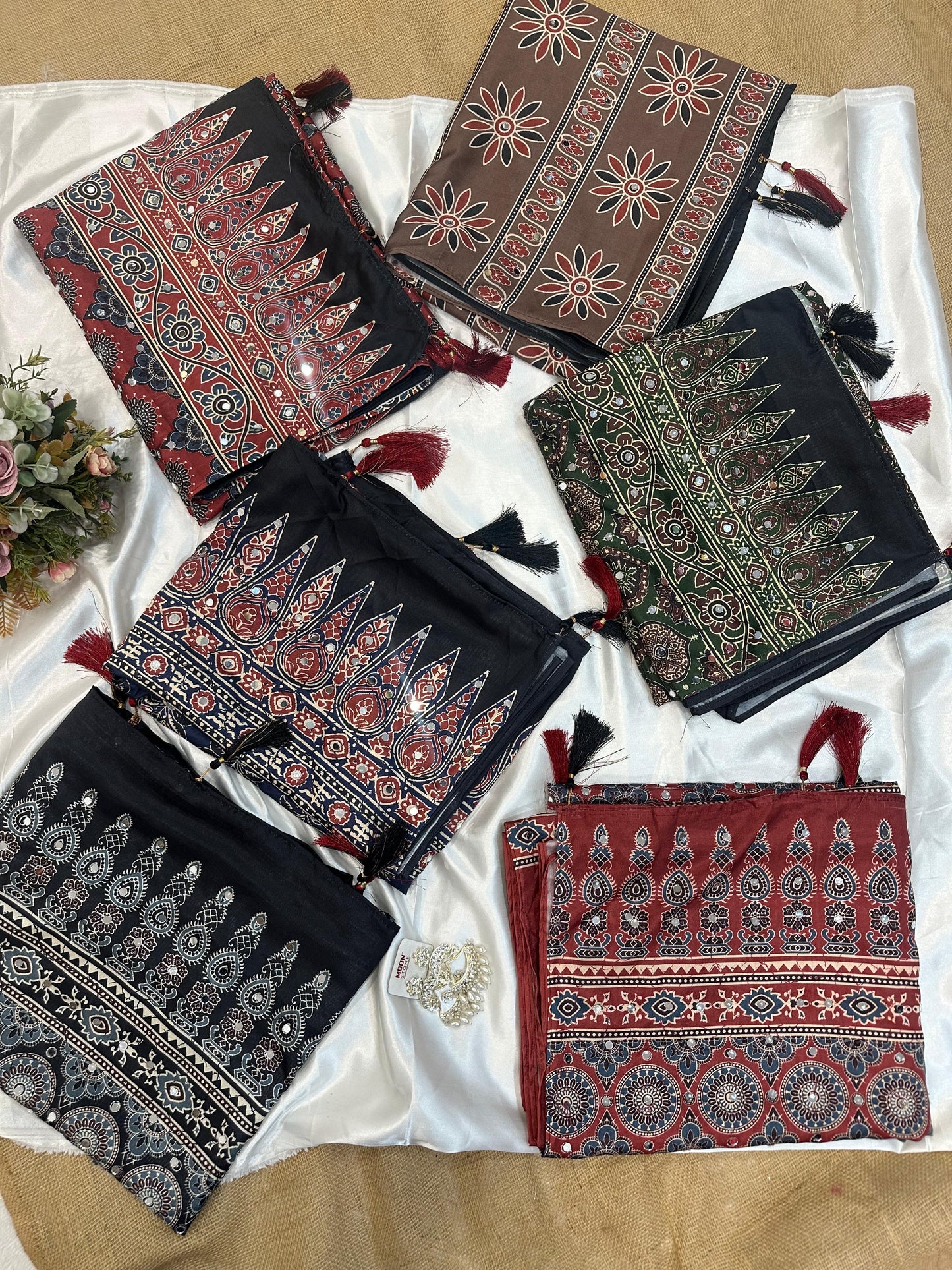 Beautiful semi crepe silk saree with ajrakh prints and mirror work