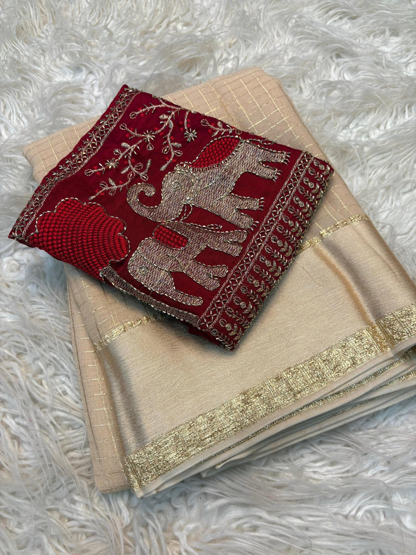 Beautiful viscous georgette checks saree in beige and red elephant blouse