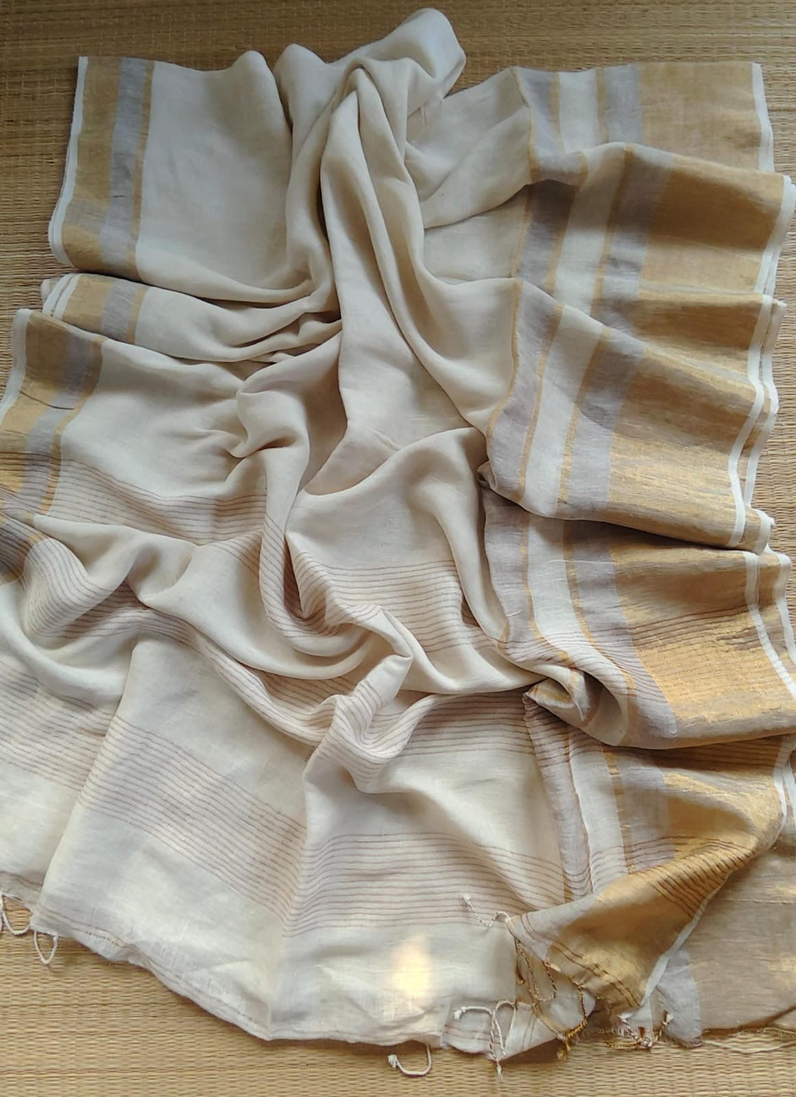 Pure handwoven linen saree with zari borders