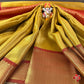 Banarasi tissue kanchi style yellow saree with contrast red border