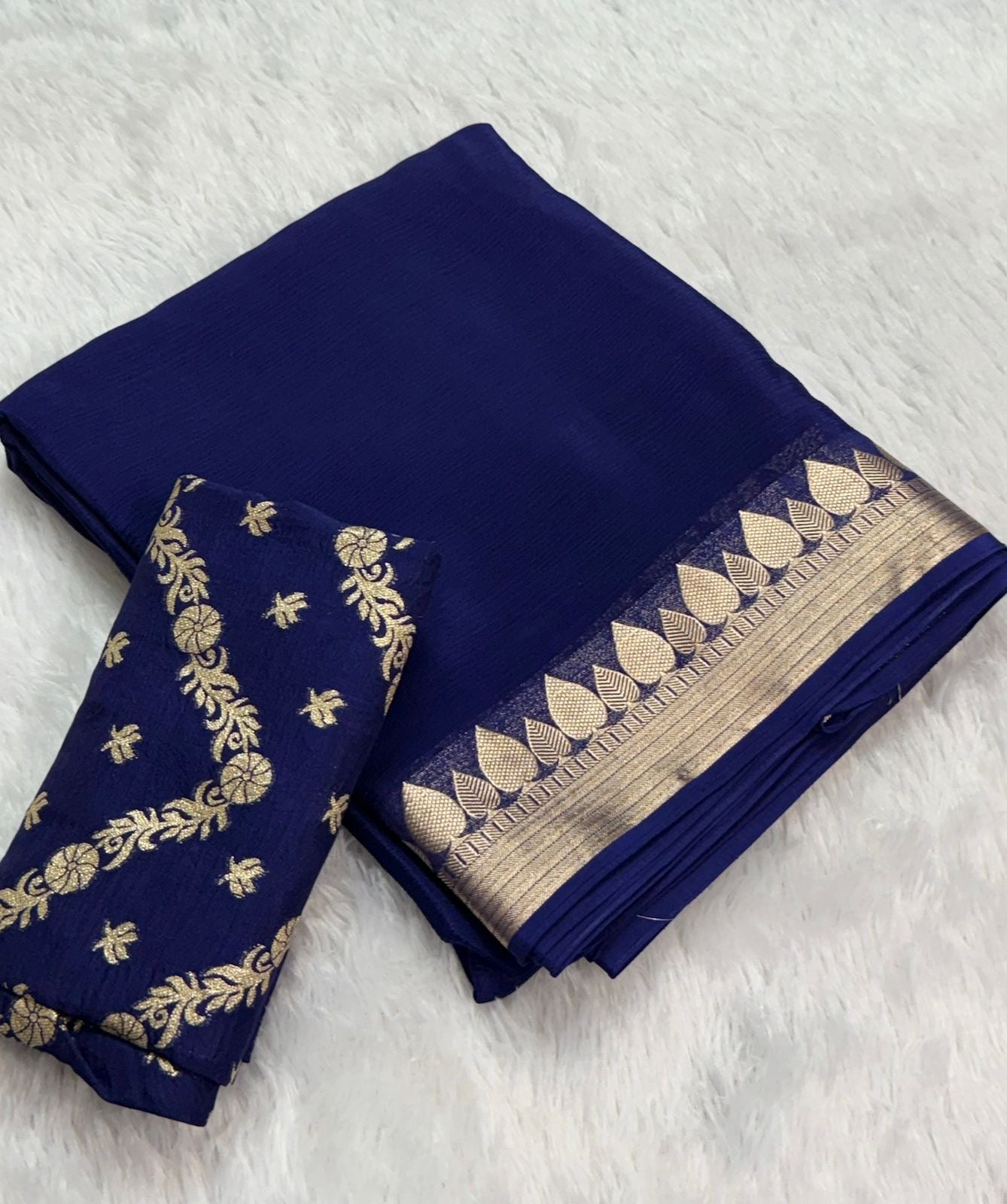 Beautiful viscous georgette saree with zari border and dola silk blouse