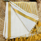 Pure and authentic mul cotton saree with broad gold zari line border on one side and small border on other side