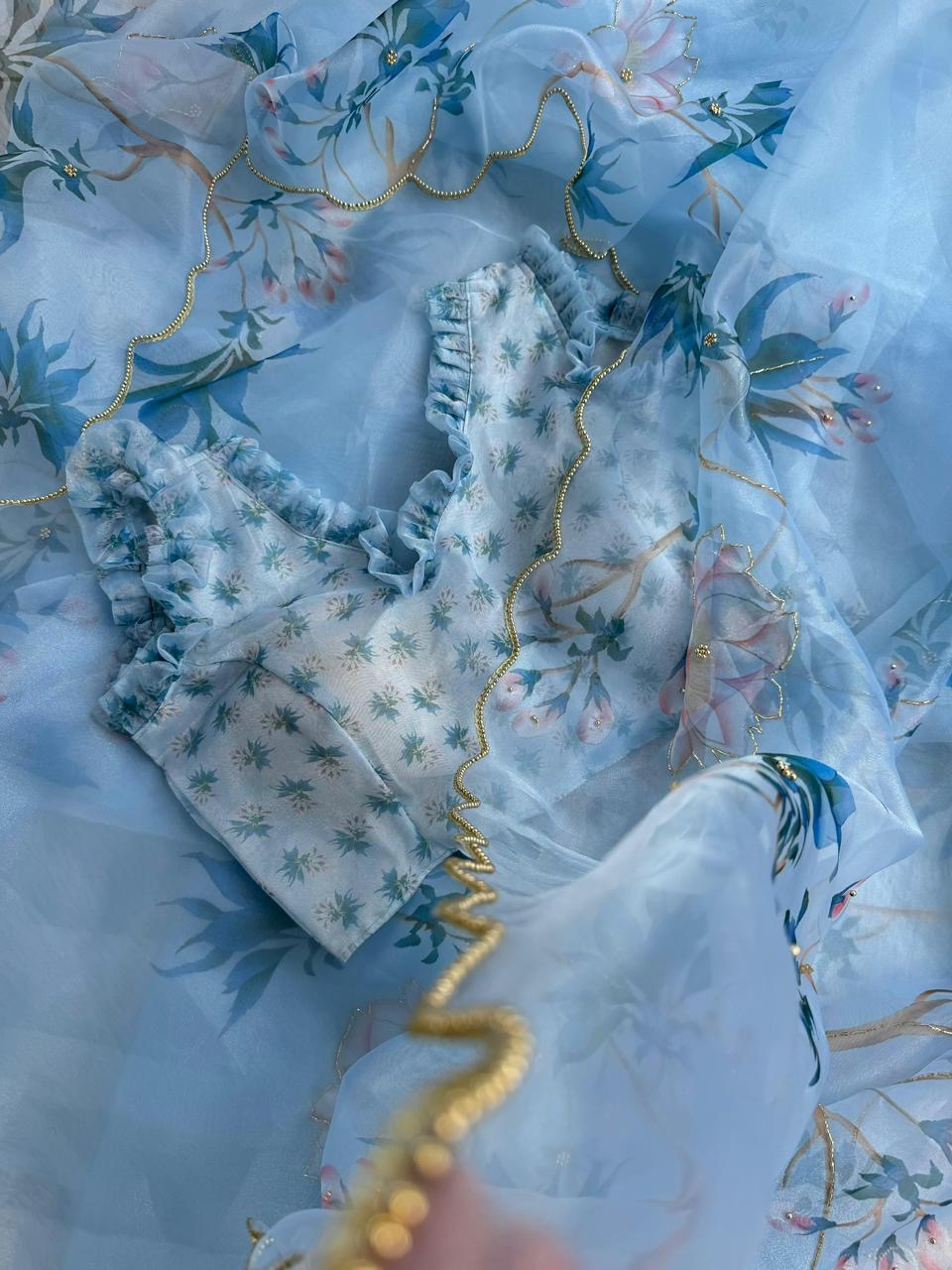 Beautiful semi organza saree with floral digital prints with cutdana beads work