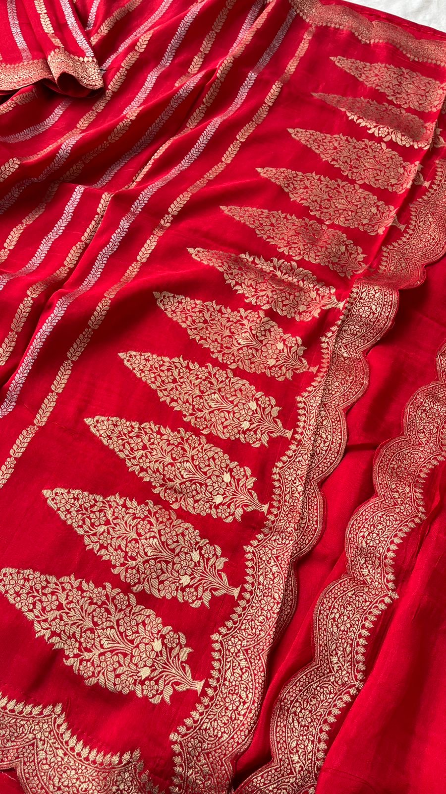Pure banarasi munga silk saree with zari stripes and scalloped border