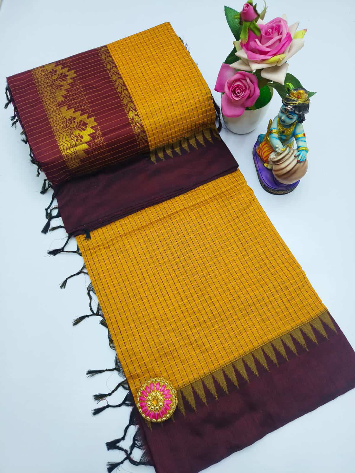 Gorgeous checked silk cotton sarees with solid temple border