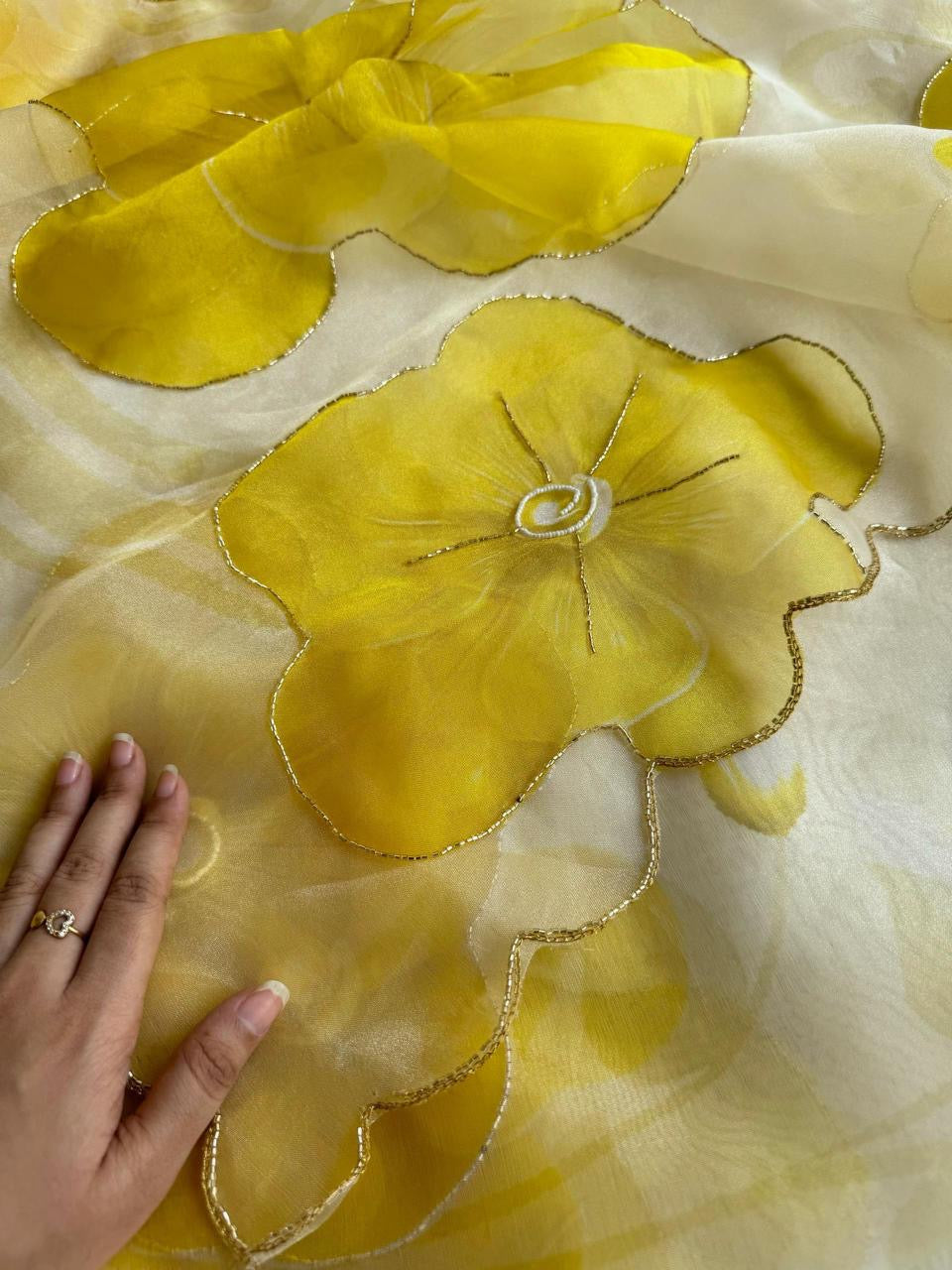 Soft semi organza saree with beautiful digital prints highlighted with beads work
