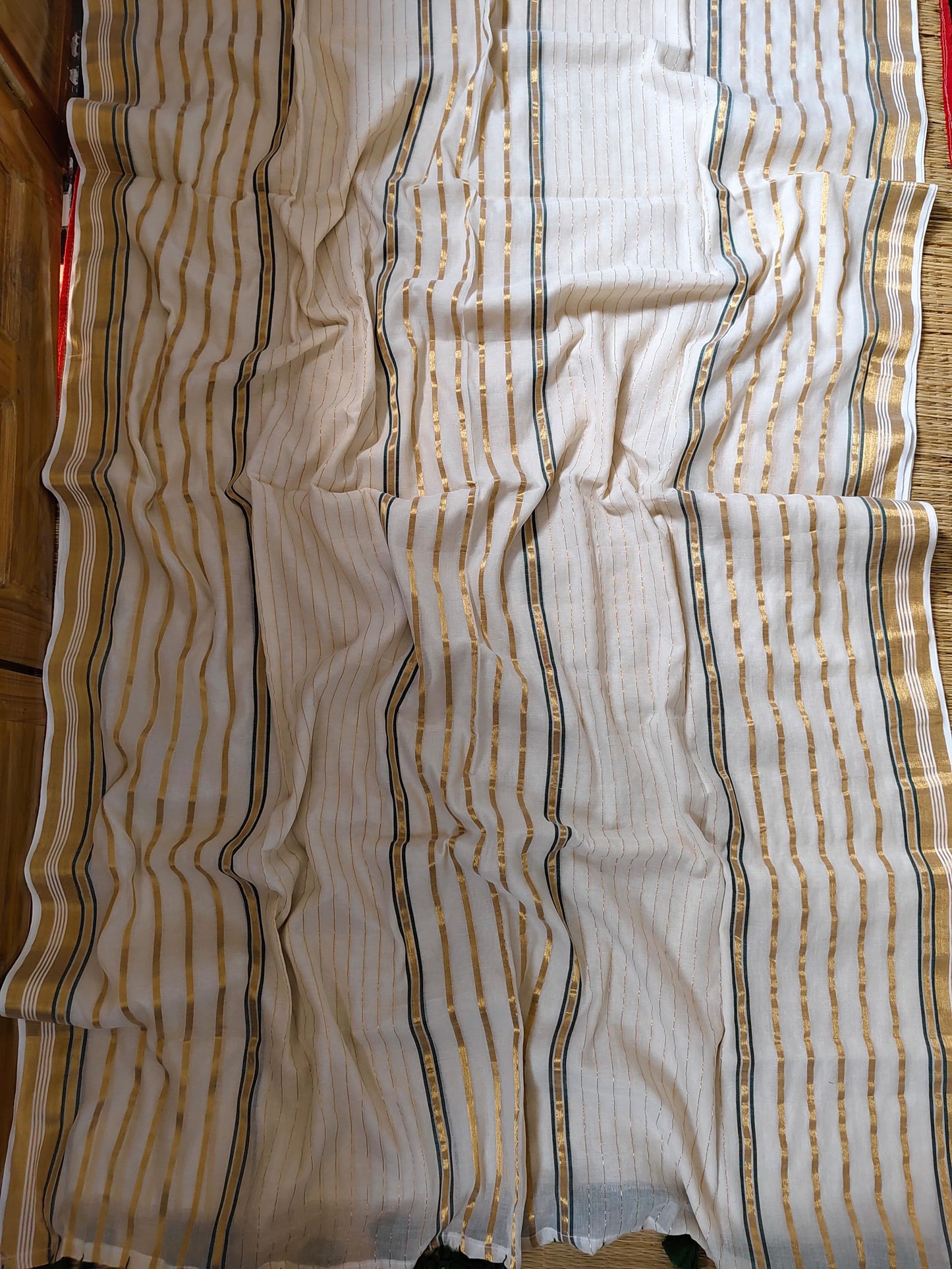 Pure and authentic mul cotton saree with zari stripes