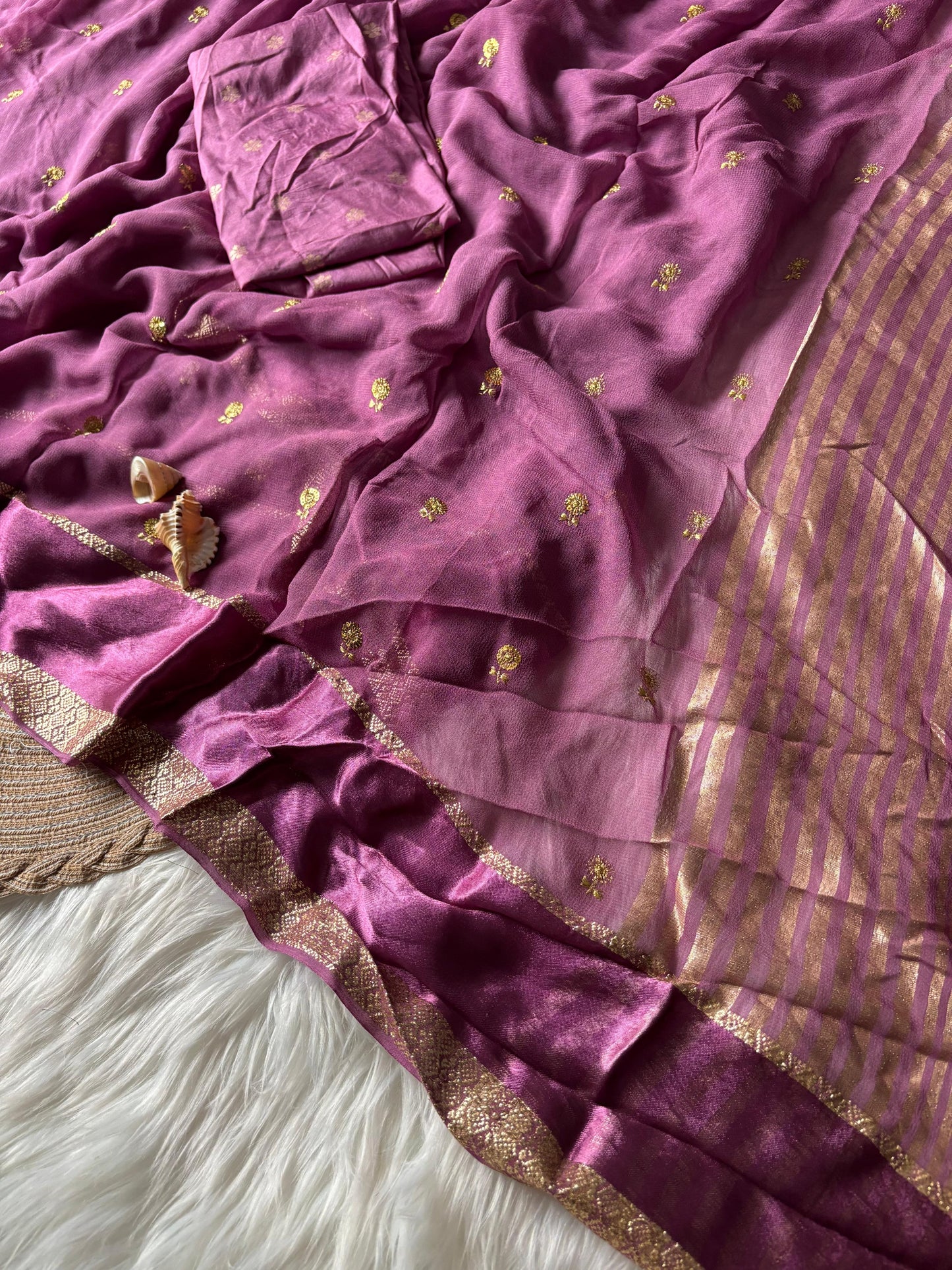 Pure georgette viscous saree with rich satin border and tiny flower buttas