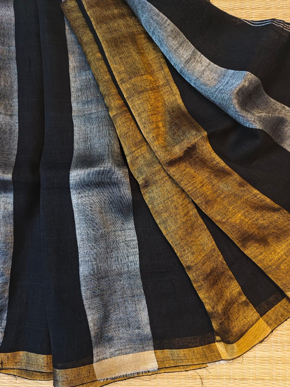 Linen sarees with gold silver zari stripes all over!