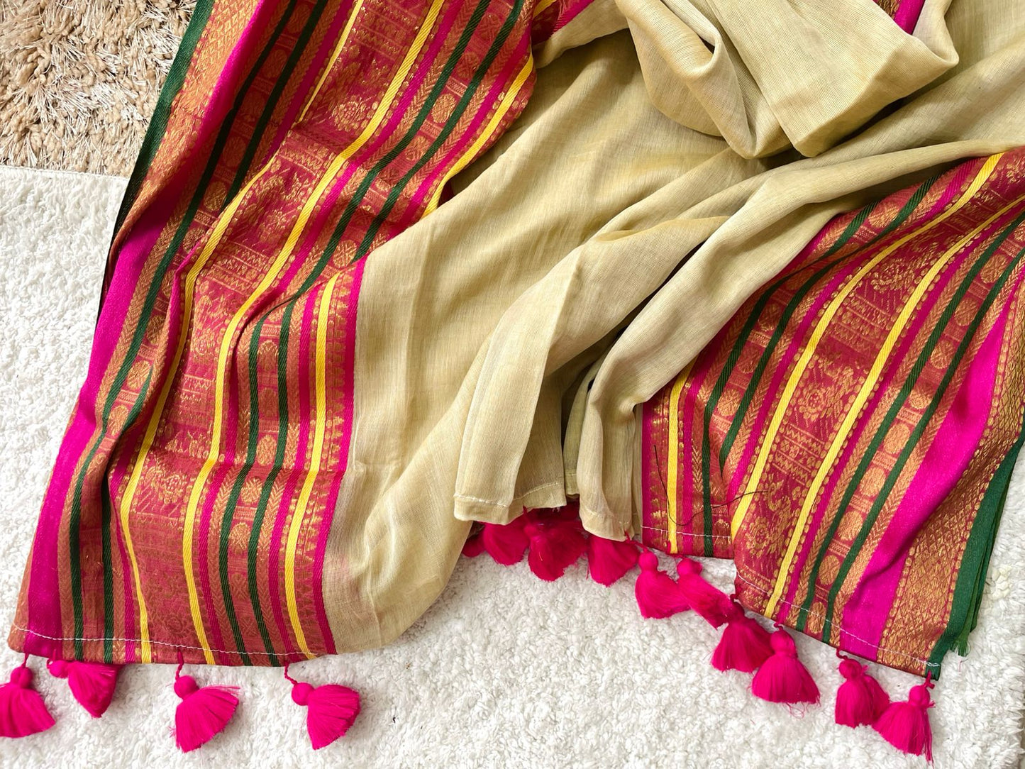 Premium pure mul cotton saree with pink tassels and jacquard border