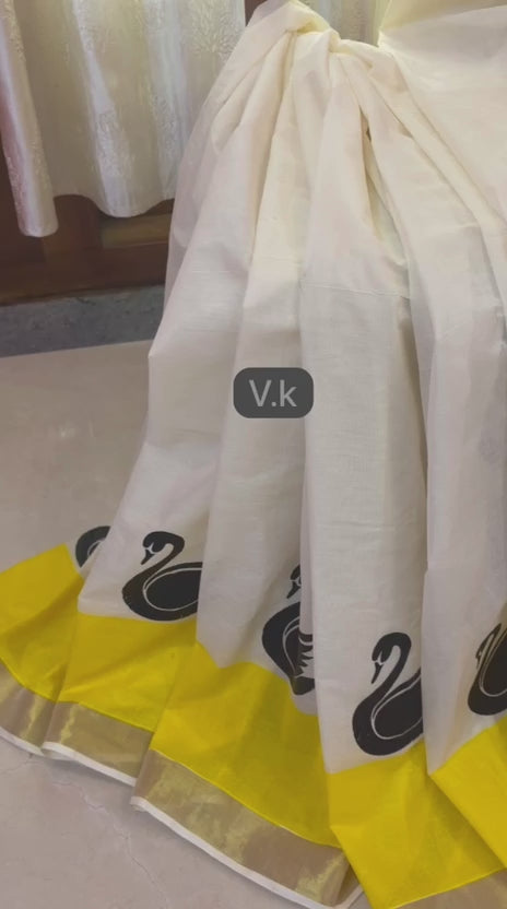 Premium Kerala cotton saree with one side yellow border with unique black swan prints (Prebooking 15 working days)